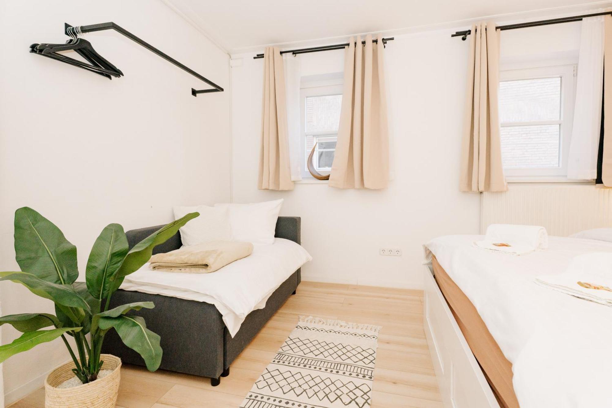 City-apartment „kreuzviertel-lädchen“mit Parkplatz Appartement *